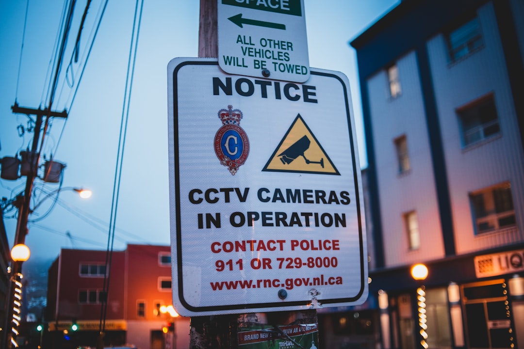 a street sign on a pole on a city street