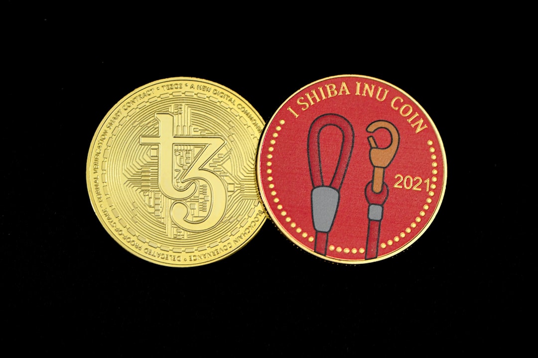 a close up of a coin on a black background
