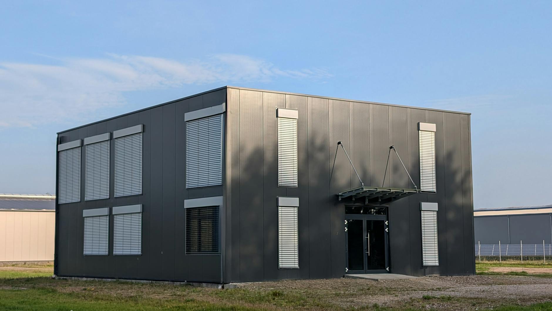 Modern industrial building exterior in Paderborn, Germany. Clear sky and contemporary design.
