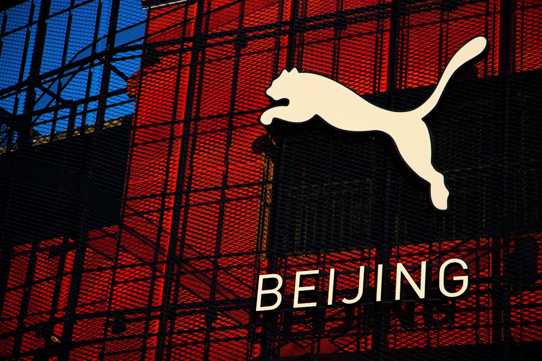 Puma logo and beijing text on building